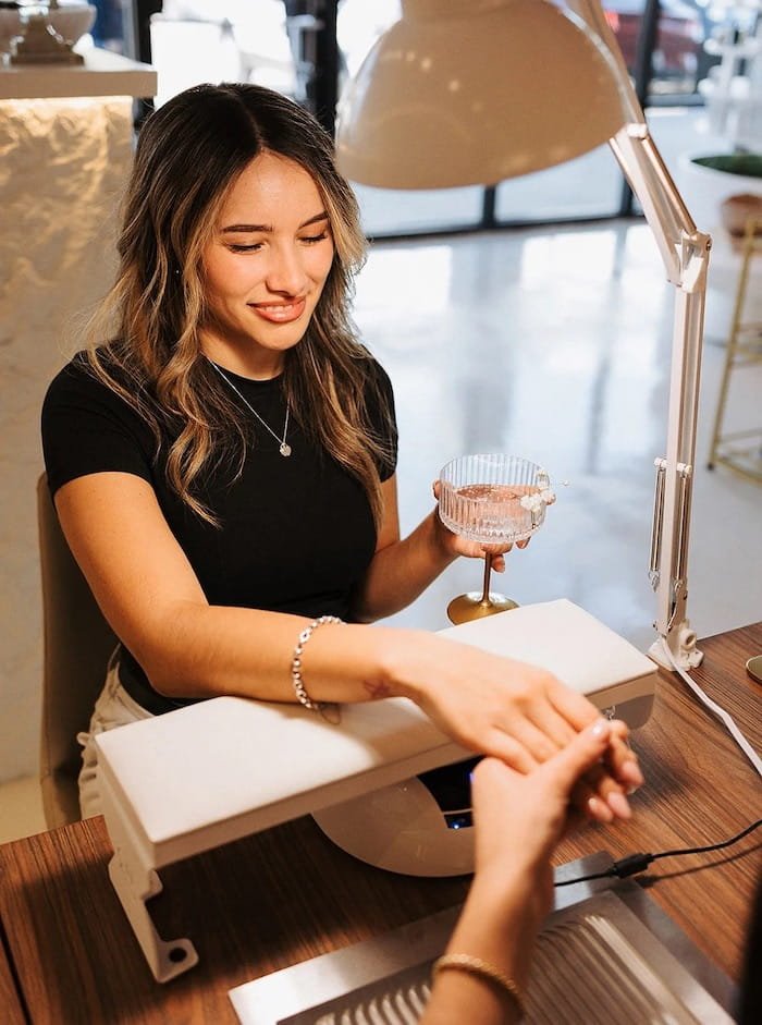 Russian manicure service at Nail Art House salon in Austin, Texas using advanced e-file cuticle techniques for a flawless finish.